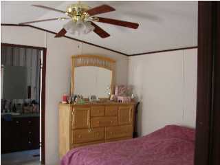 6238 Old River Road Baker, FL 32531 - Photo 6 of 8 a view of a hallway
