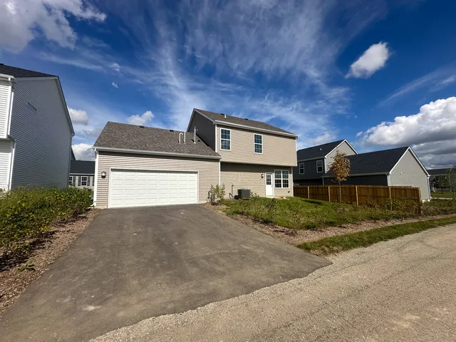 front view of a house with a street