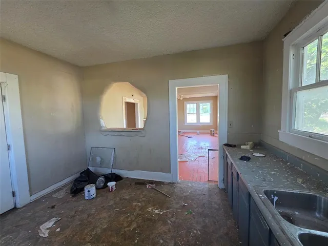 an empty room with windows