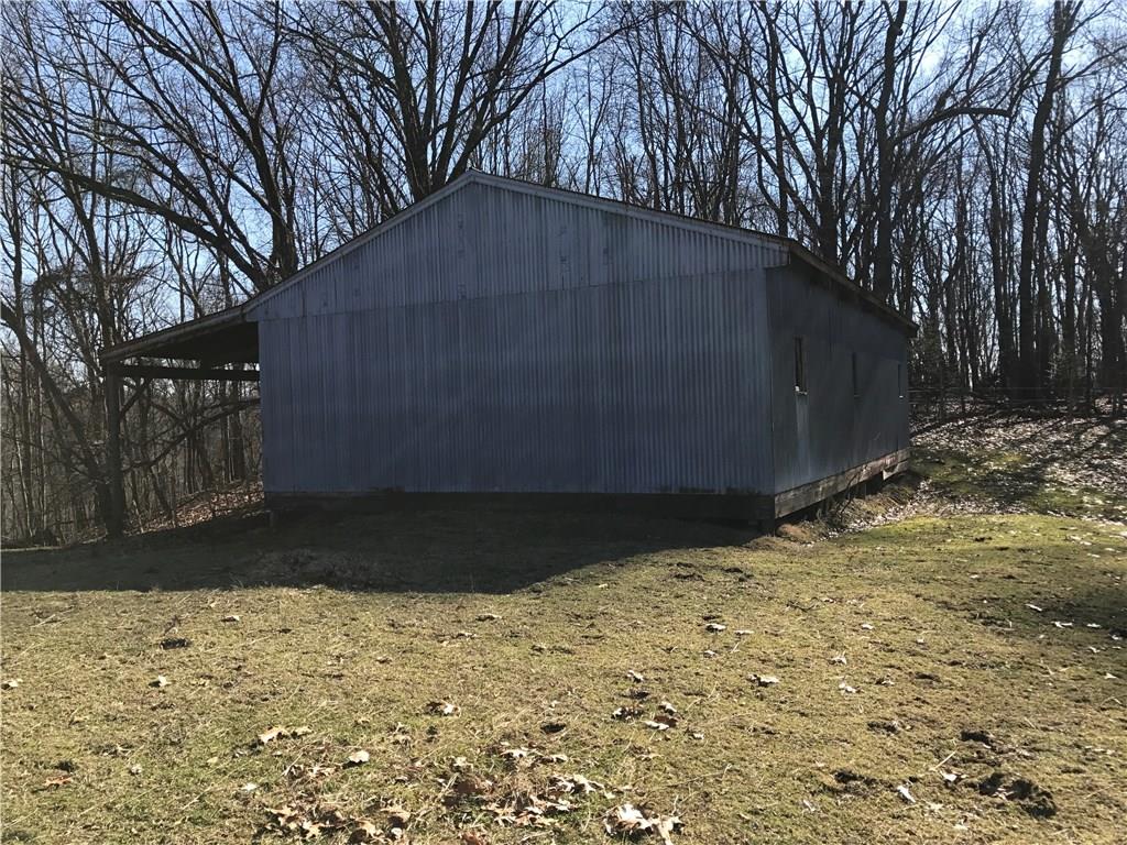 3600 Centerview Road Gibsonia, PA 15044 - Photo 19 of 25 Furthest away, but spacious, this barn has a shady porch for horses to gather out of the sun when in this barn or field.
