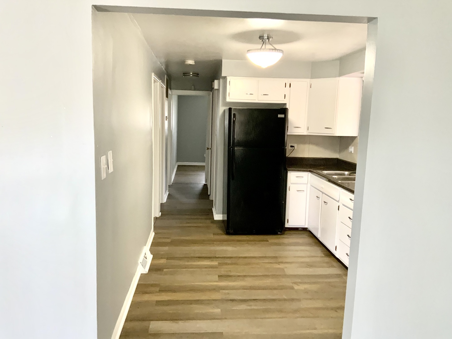 11634 South May Street Chicago, IL 60643 - Photo 6 of 9 a kitchen with a refrigerator and cabinets