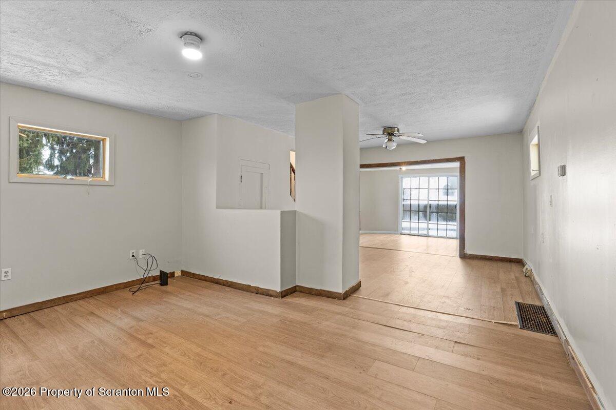 719 South Webster Avenue Scranton, PA 18505 - Photo 4 of 17 an empty room with windows and closet