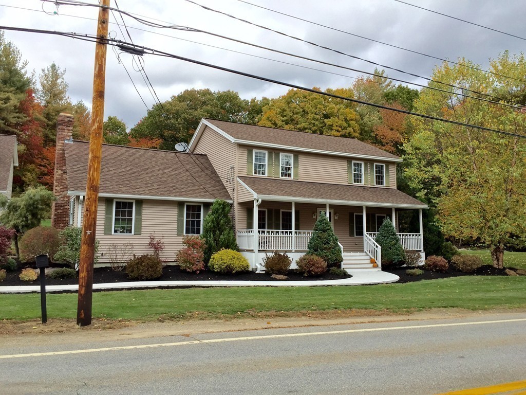159 Fitchburg Road Ashburnham, MA 01430 - Photo 12 of 13 a front view of a house with a garden