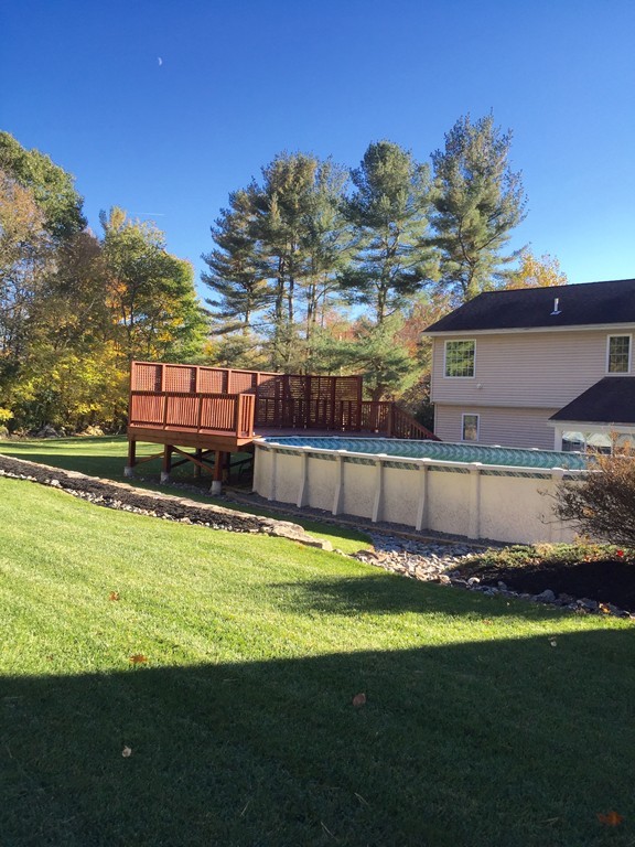 159 Fitchburg Road Ashburnham, MA 01430 - Photo 8 of 13 a view of a backyard with a swimming pool
