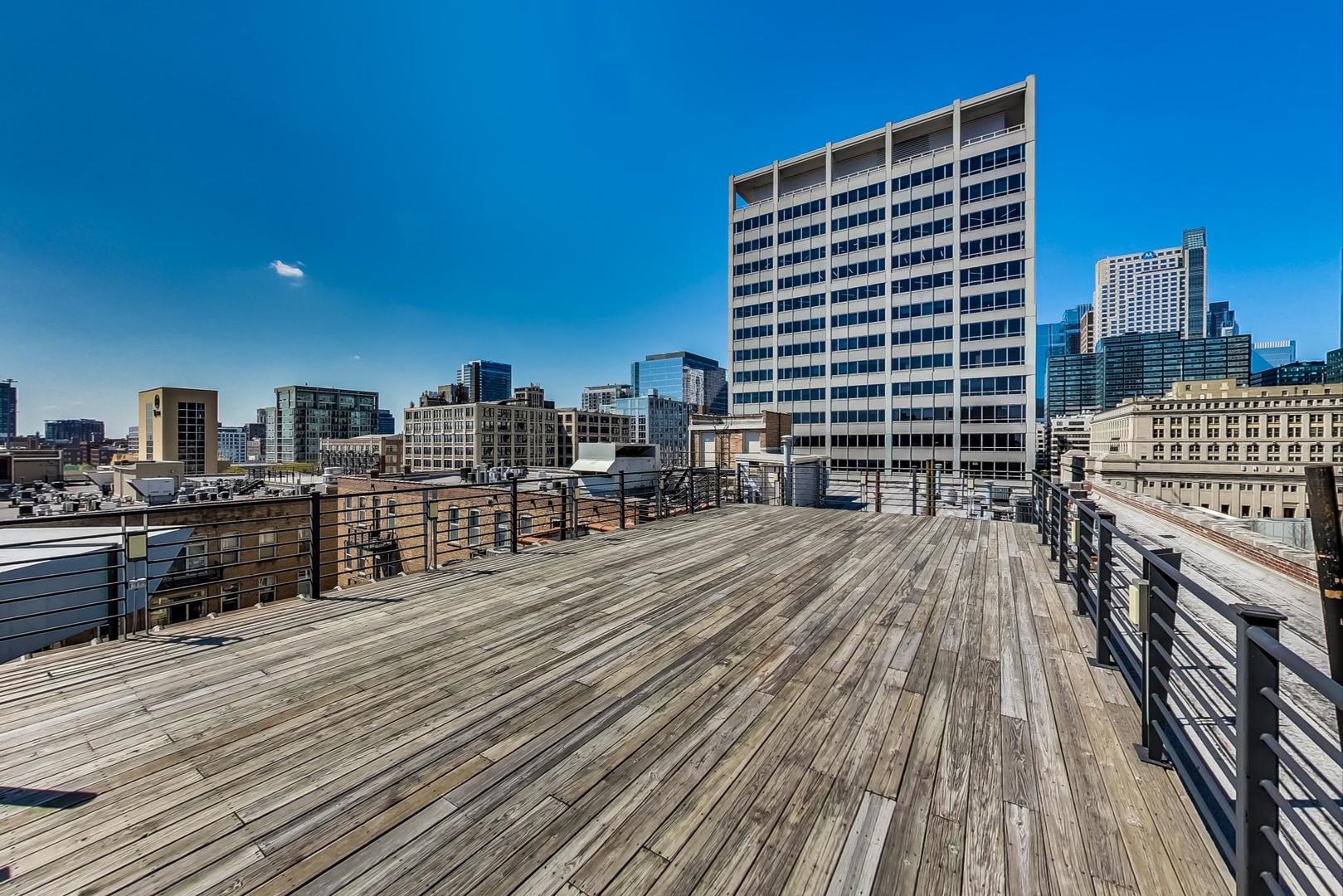 420 South Clinton Street, Unit 414A Chicago, IL 60607 - Photo 11 of 13 a city view with tall buildings