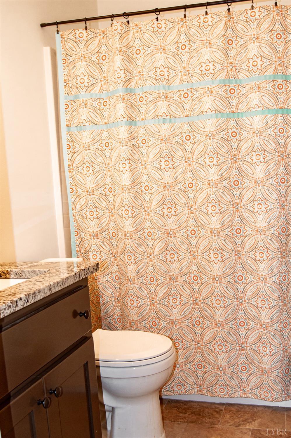 7108 Callands Road Chatham, VA 24531 - Photo 22 of 63 a bathroom with a granite countertop toilet and sink