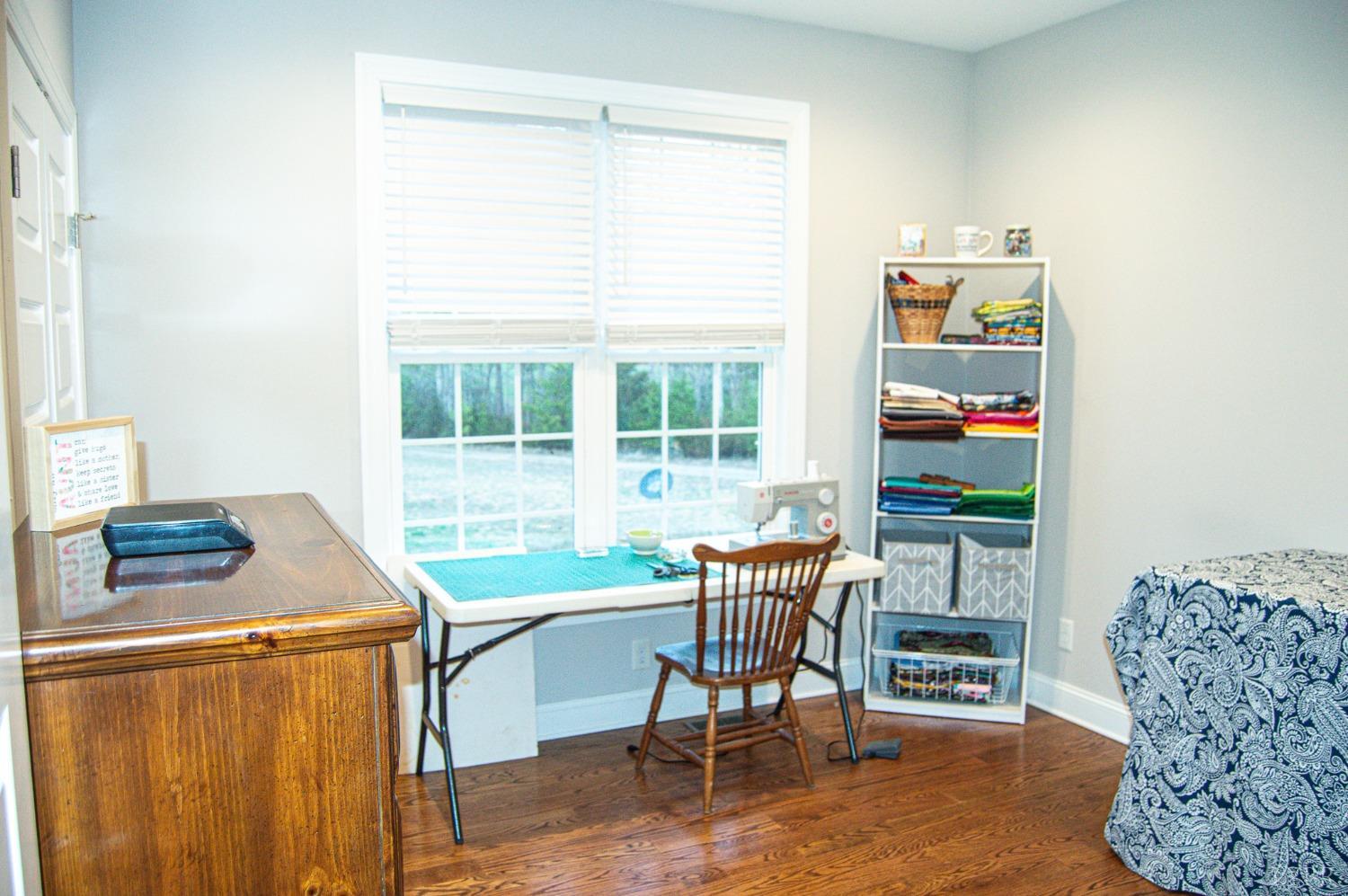7108 Callands Road Chatham, VA 24531 - Photo 24 of 63 a work room with furniture a rug and a window