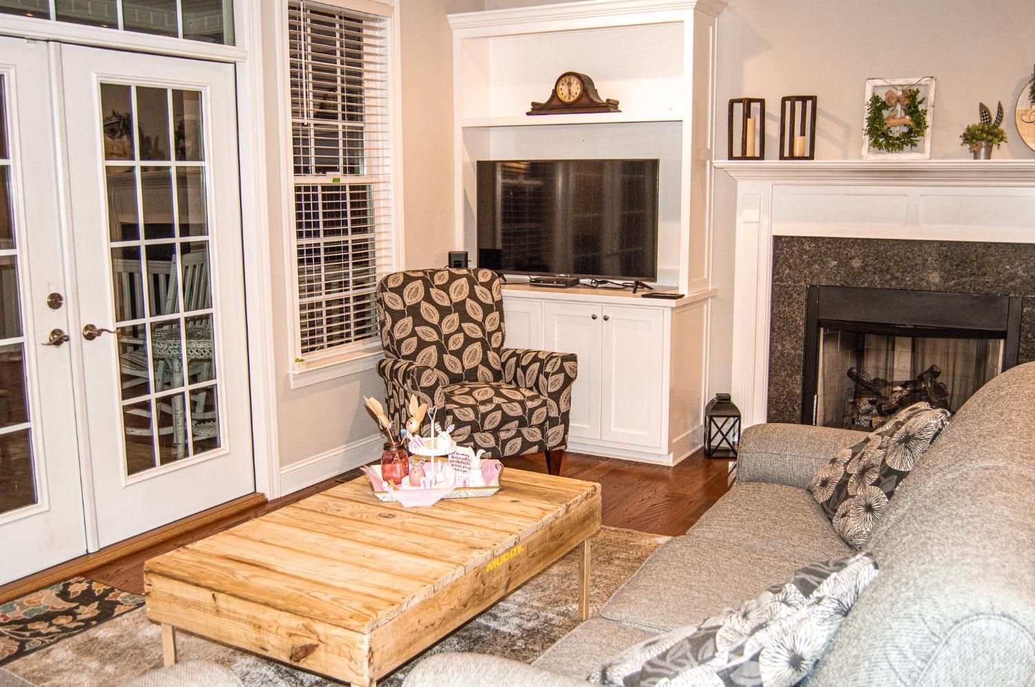 7108 Callands Road Chatham, VA 24531 - Photo 27 of 63 a living room with furniture fireplace and flat screen tv