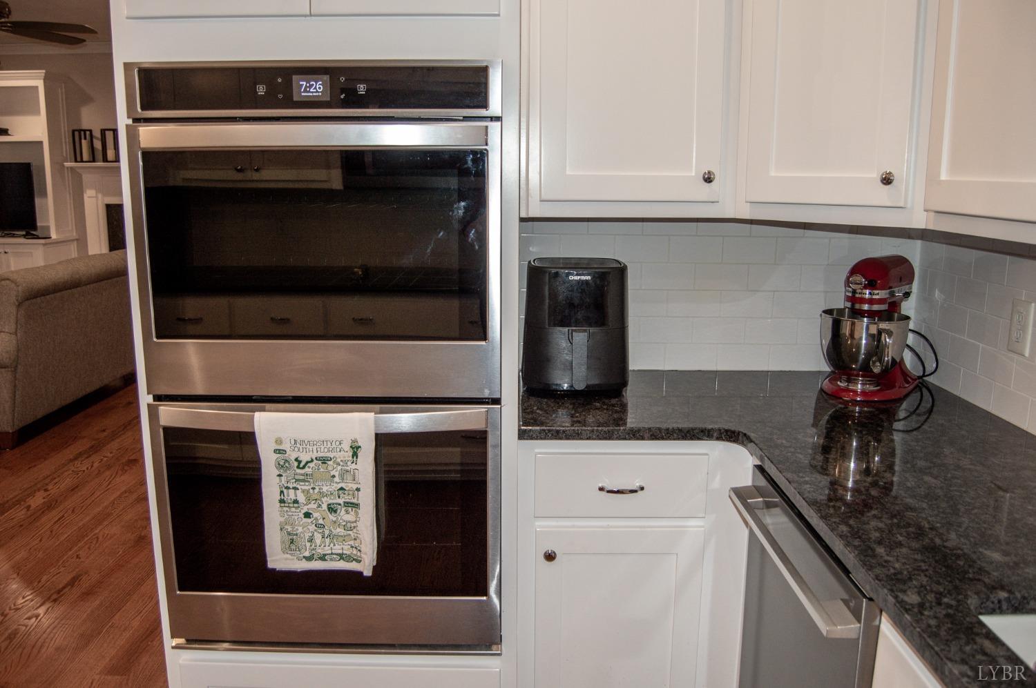 7108 Callands Road Chatham, VA 24531 - Photo 32 of 63 a kitchen with a stove and white cabinets