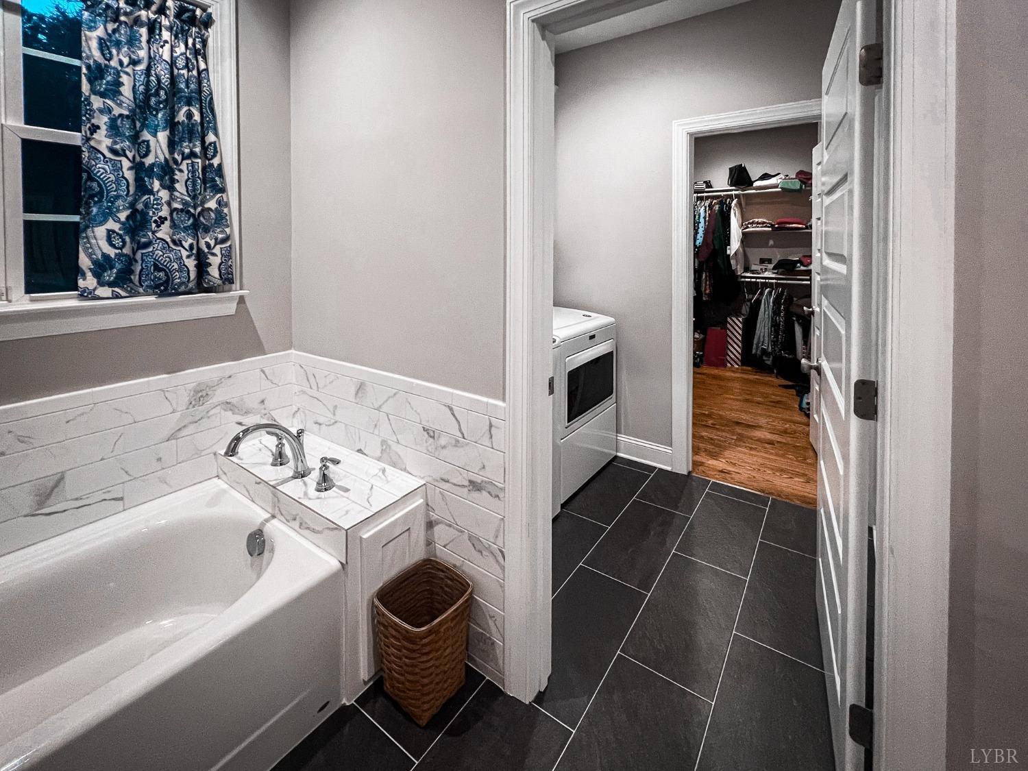 7108 Callands Road Chatham, VA 24531 - Photo 57 of 63 a bathroom with a sink and a bathtub