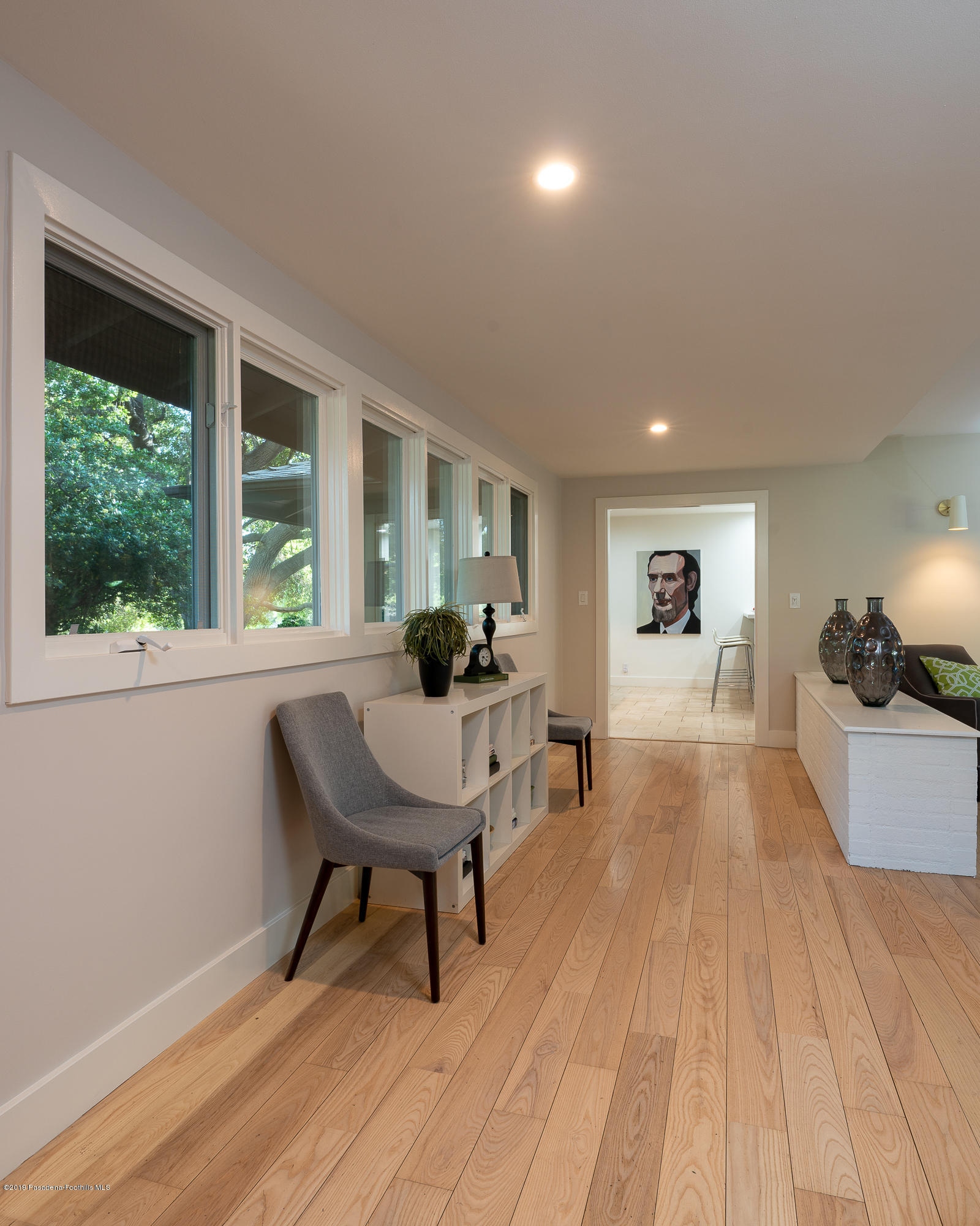 3795 Shadow Grove Road Pasadena, CA 91107 - Photo 11 of 48 a living room with furniture and a wooden floor
