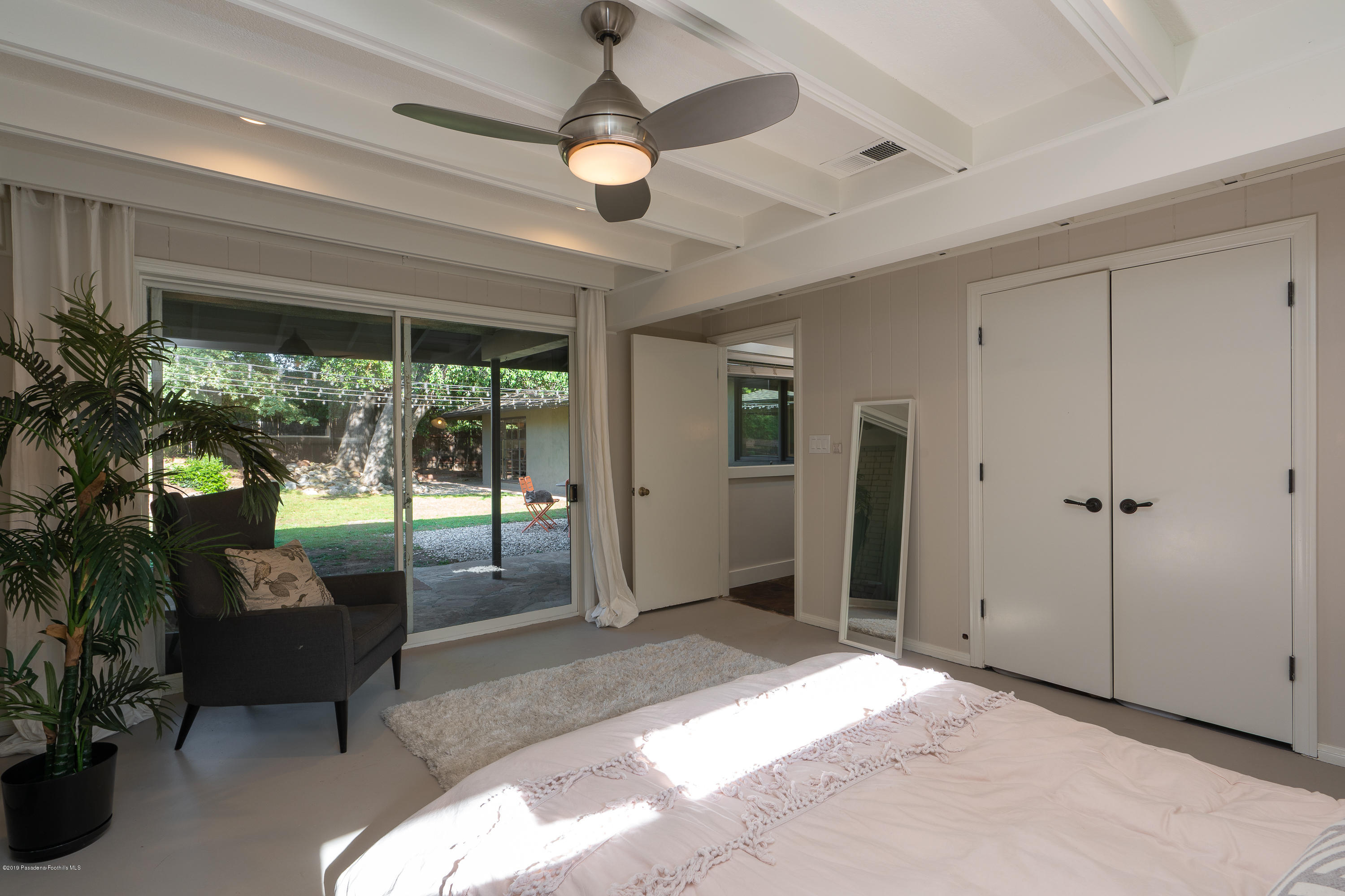 3795 Shadow Grove Road Pasadena, CA 91107 - Photo 20 of 48 a view of a livingroom with furniture and floor to ceiling window