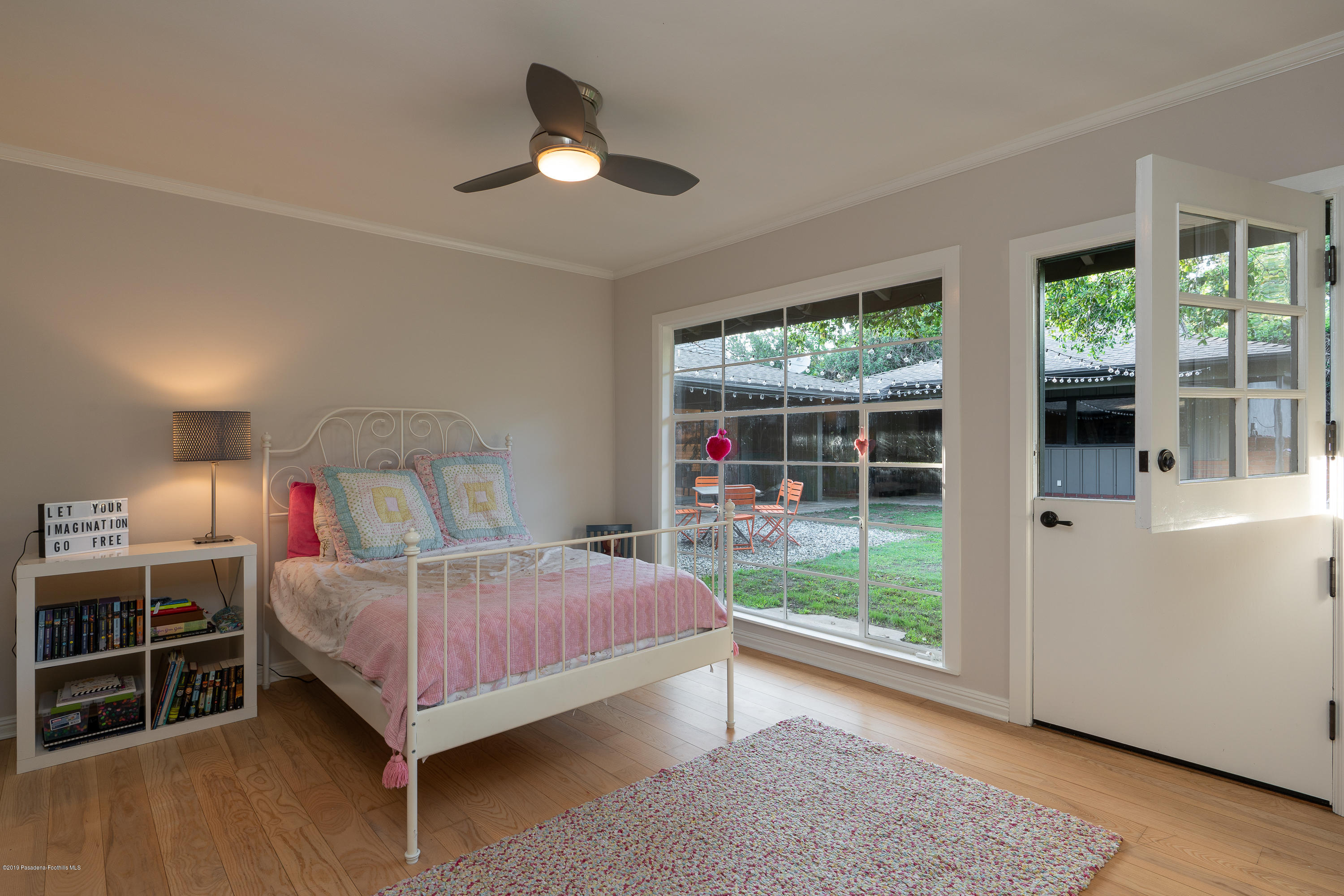 3795 Shadow Grove Road Pasadena, CA 91107 - Photo 25 of 48 a bedroom with a bed and a large window
