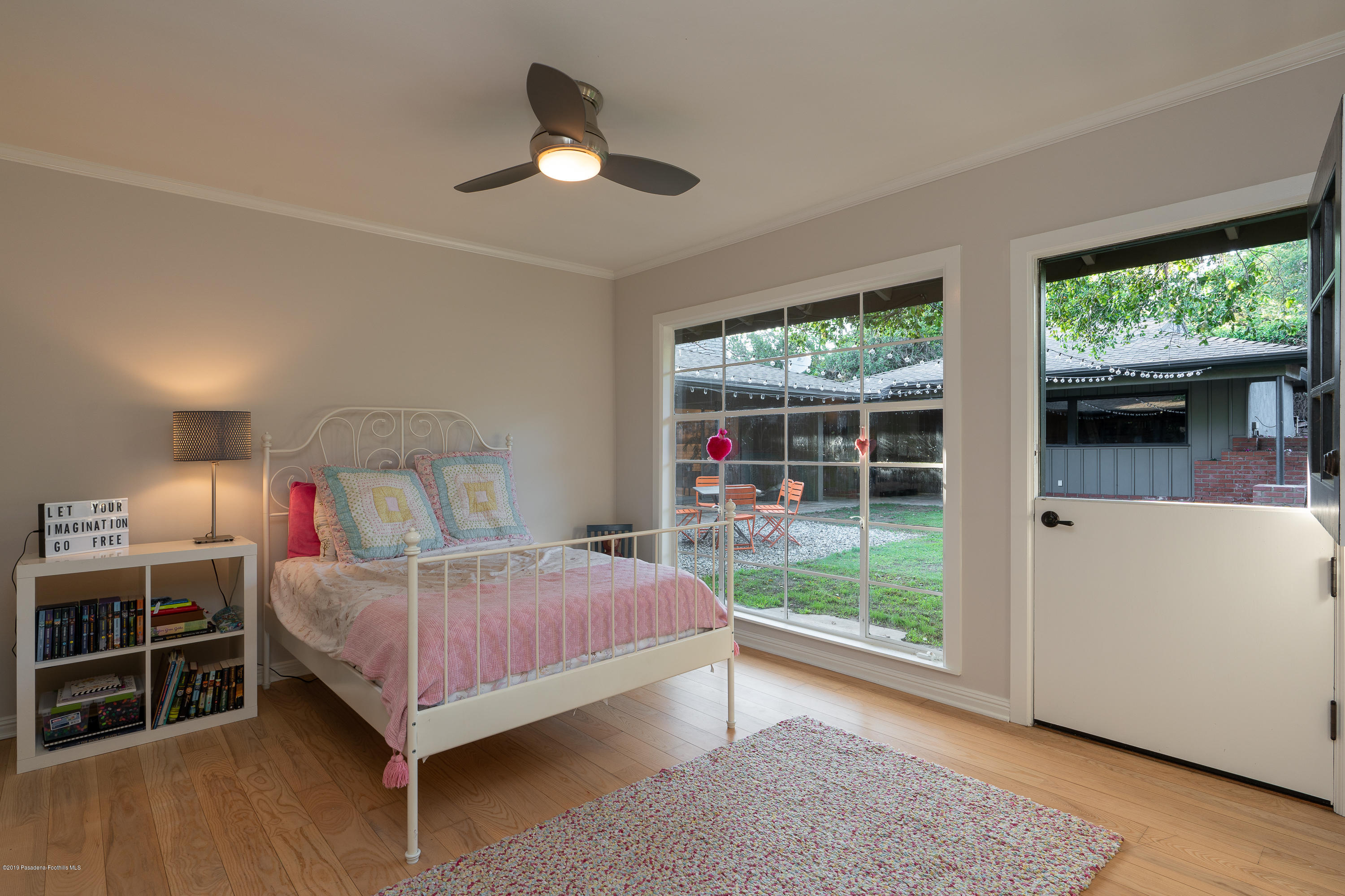 3795 Shadow Grove Road Pasadena, CA 91107 - Photo 26 of 48 a bedroom with a bed and a large window