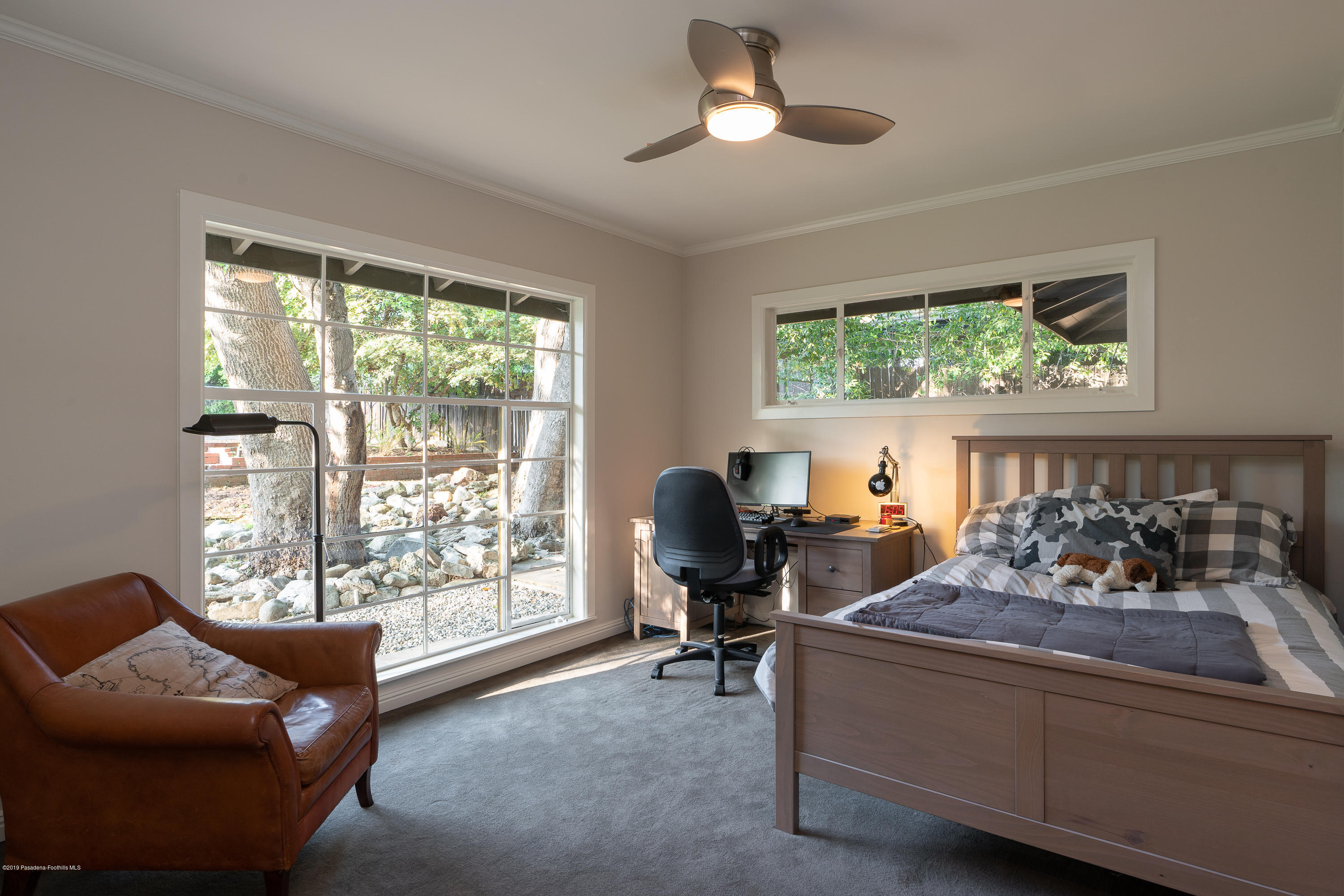 3795 Shadow Grove Road Pasadena, CA 91107 - Photo 27 of 48 a living room with furniture and a large window