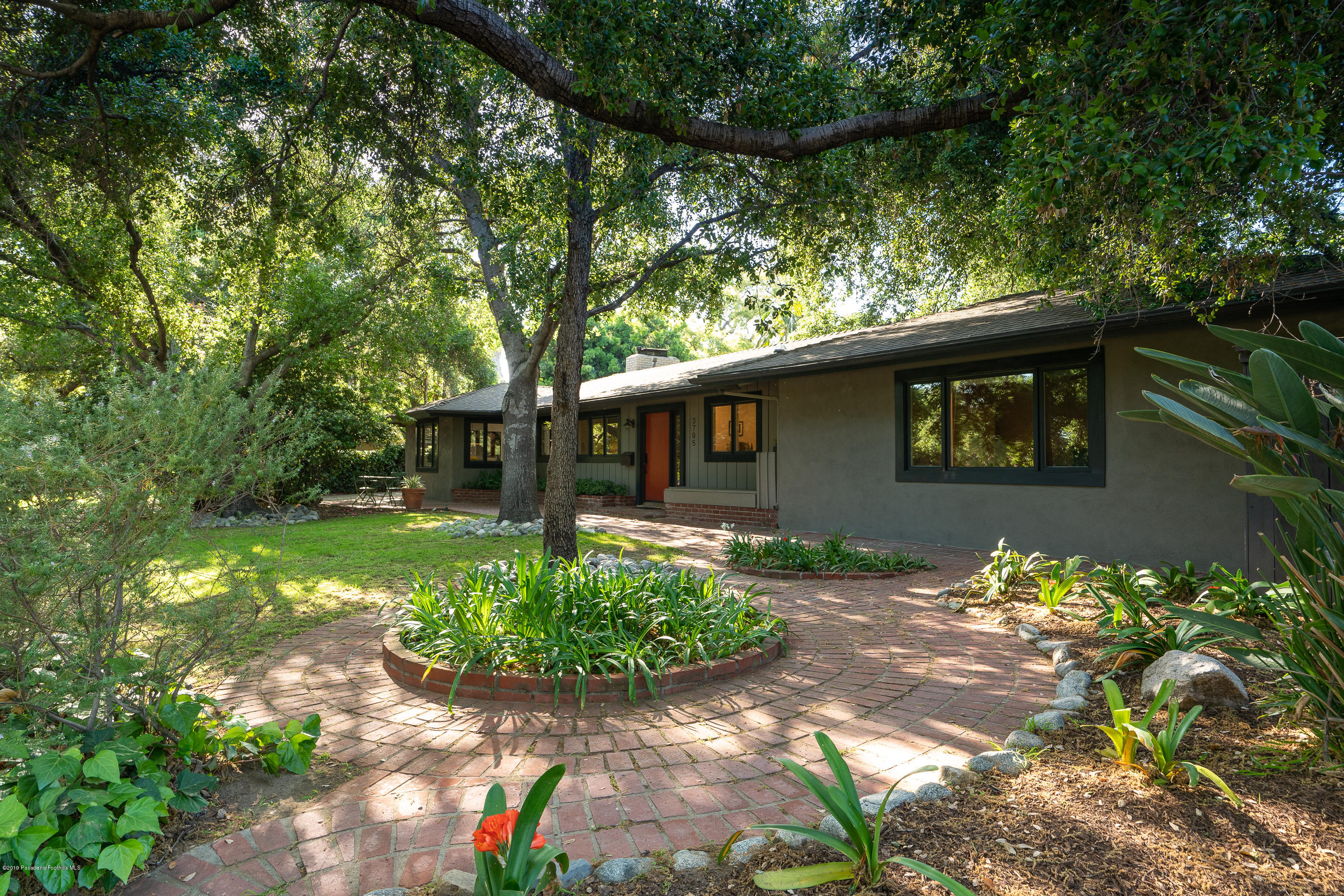 3795 Shadow Grove Road Pasadena, CA 91107 - Photo 4 of 48 a front view of a house with garden