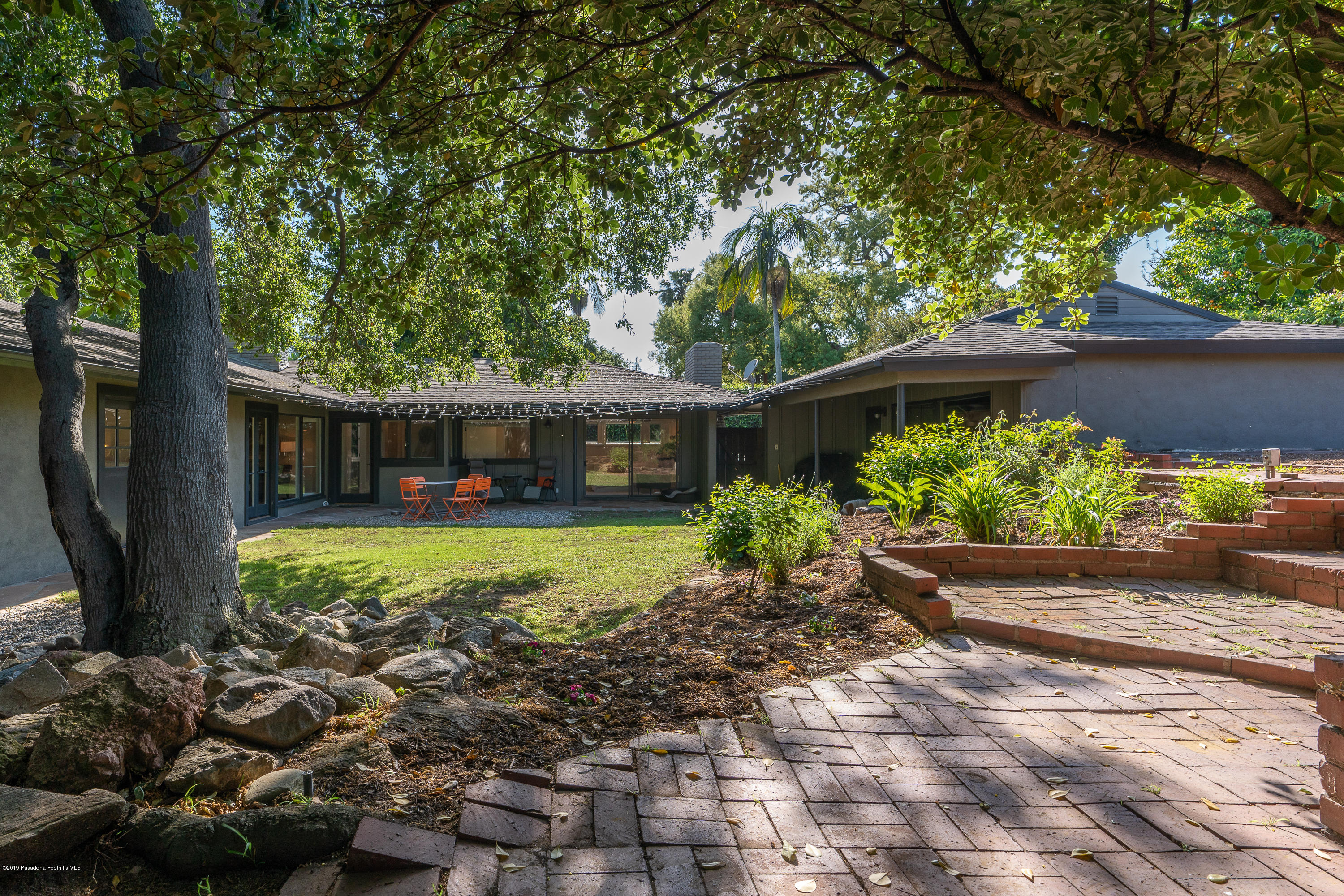 3795 Shadow Grove Road Pasadena, CA 91107 - Photo 34 of 48 a front view of a house with a yard