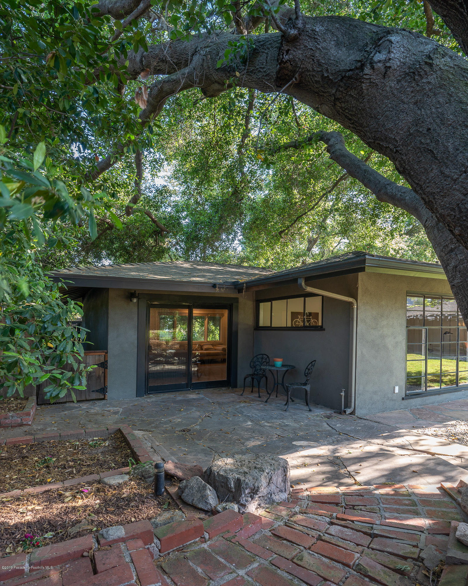3795 Shadow Grove Road Pasadena, CA 91107 - Photo 35 of 48 a view of a house with a yard