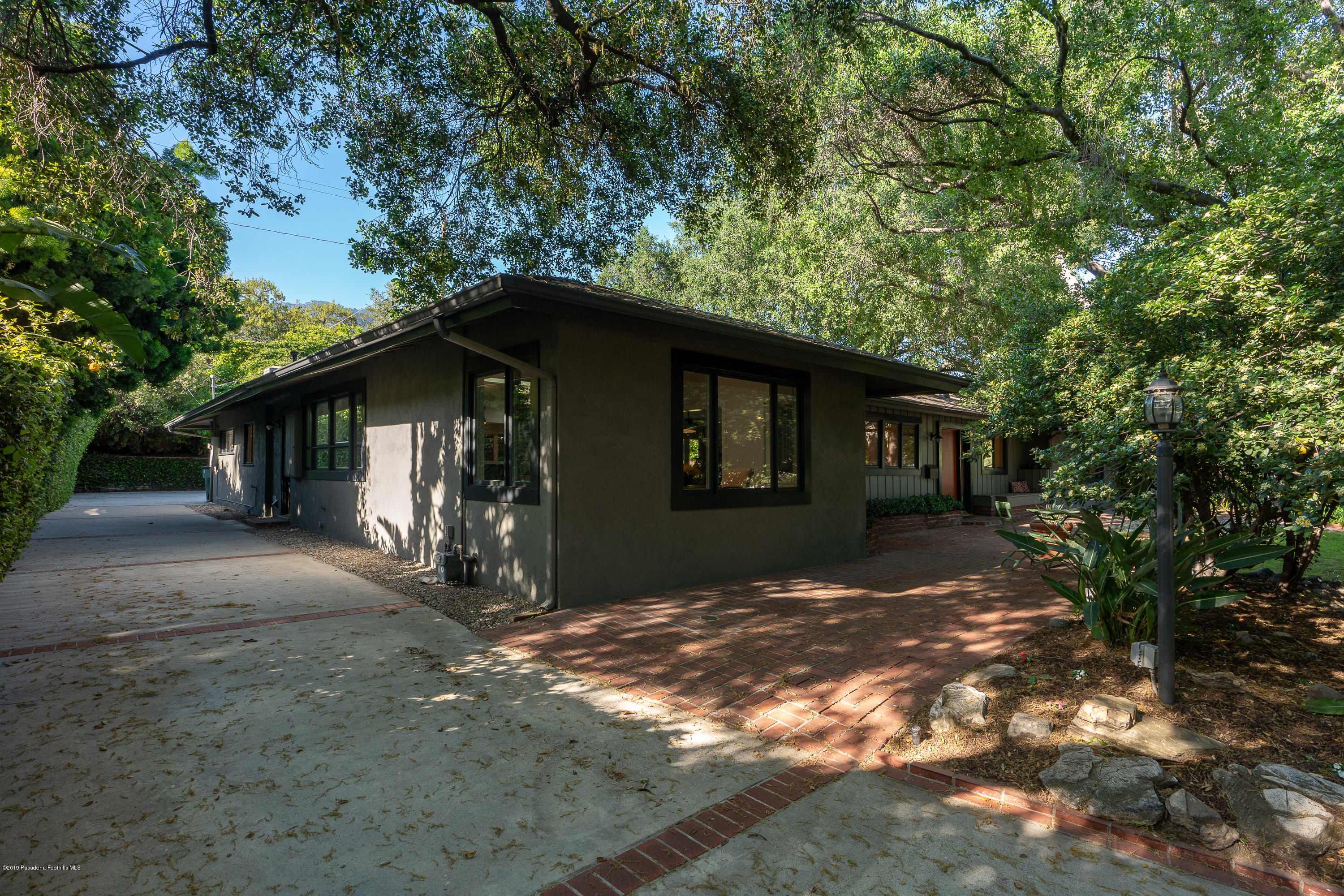 3795 Shadow Grove Road Pasadena, CA 91107 - Photo 37 of 48 a view of a house with a tree