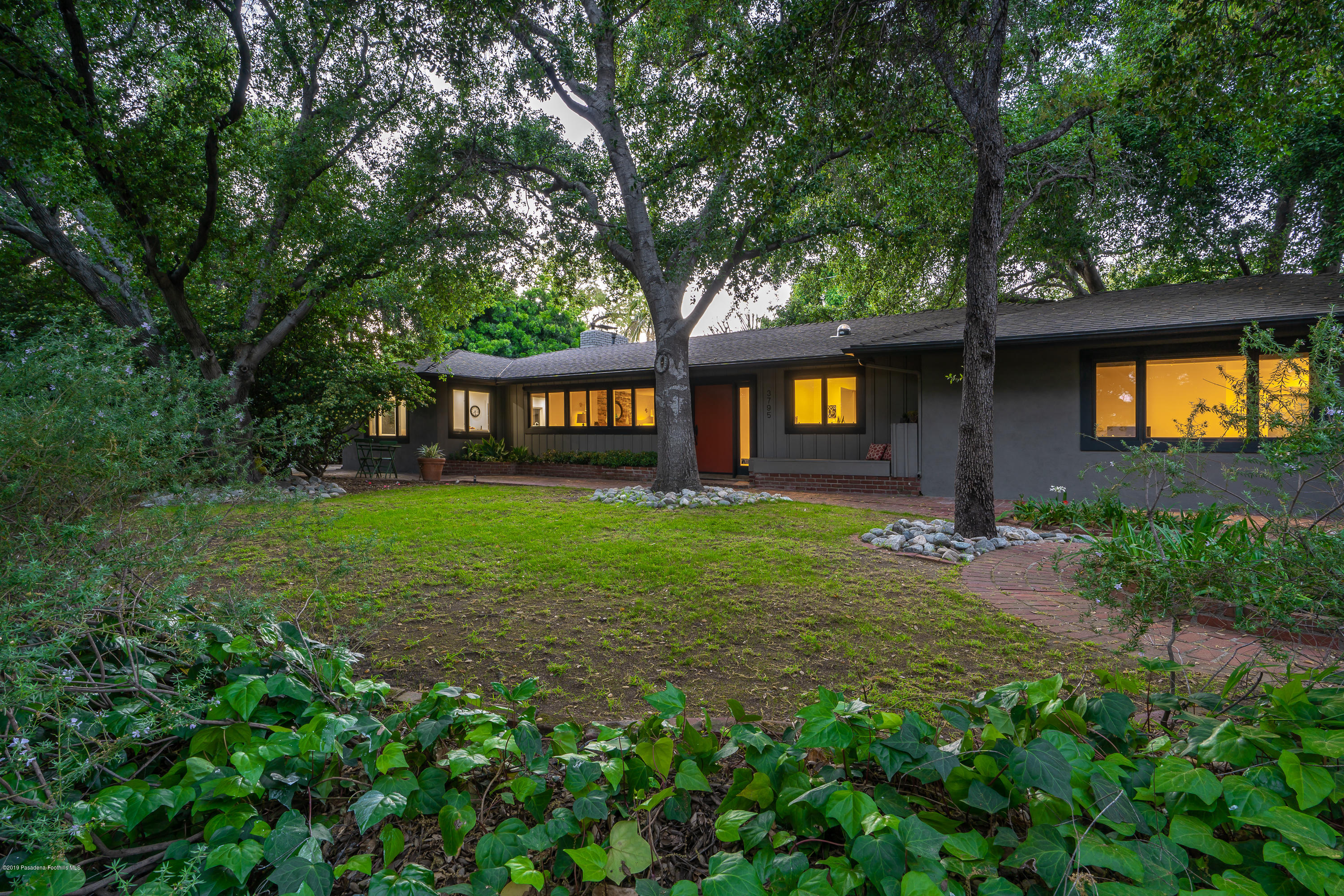 3795 Shadow Grove Road Pasadena, CA 91107 - Photo 40 of 48 a view of a house with backyard and sitting area