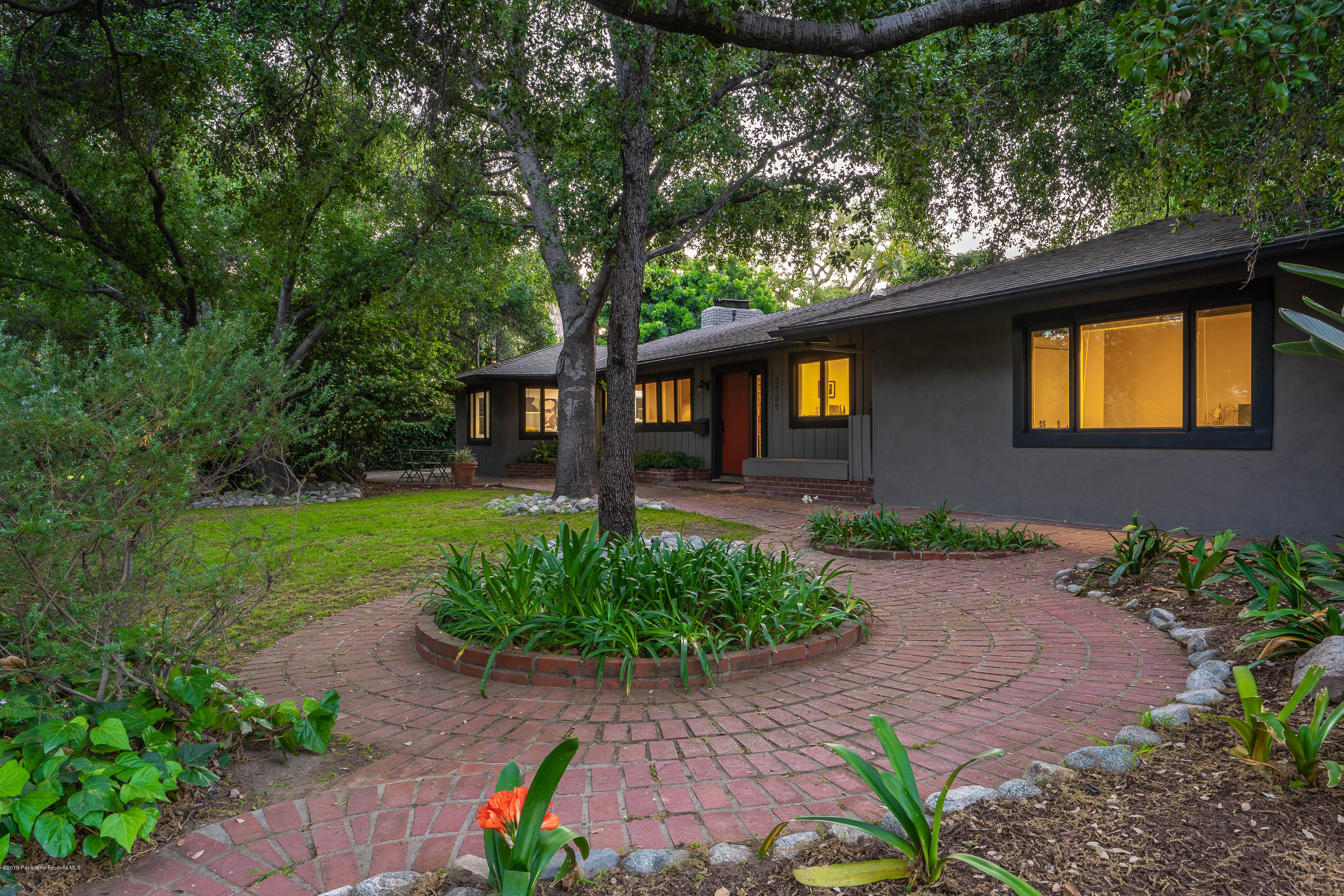3795 Shadow Grove Road Pasadena, CA 91107 - Photo 41 of 48 a front view of a house with a yard