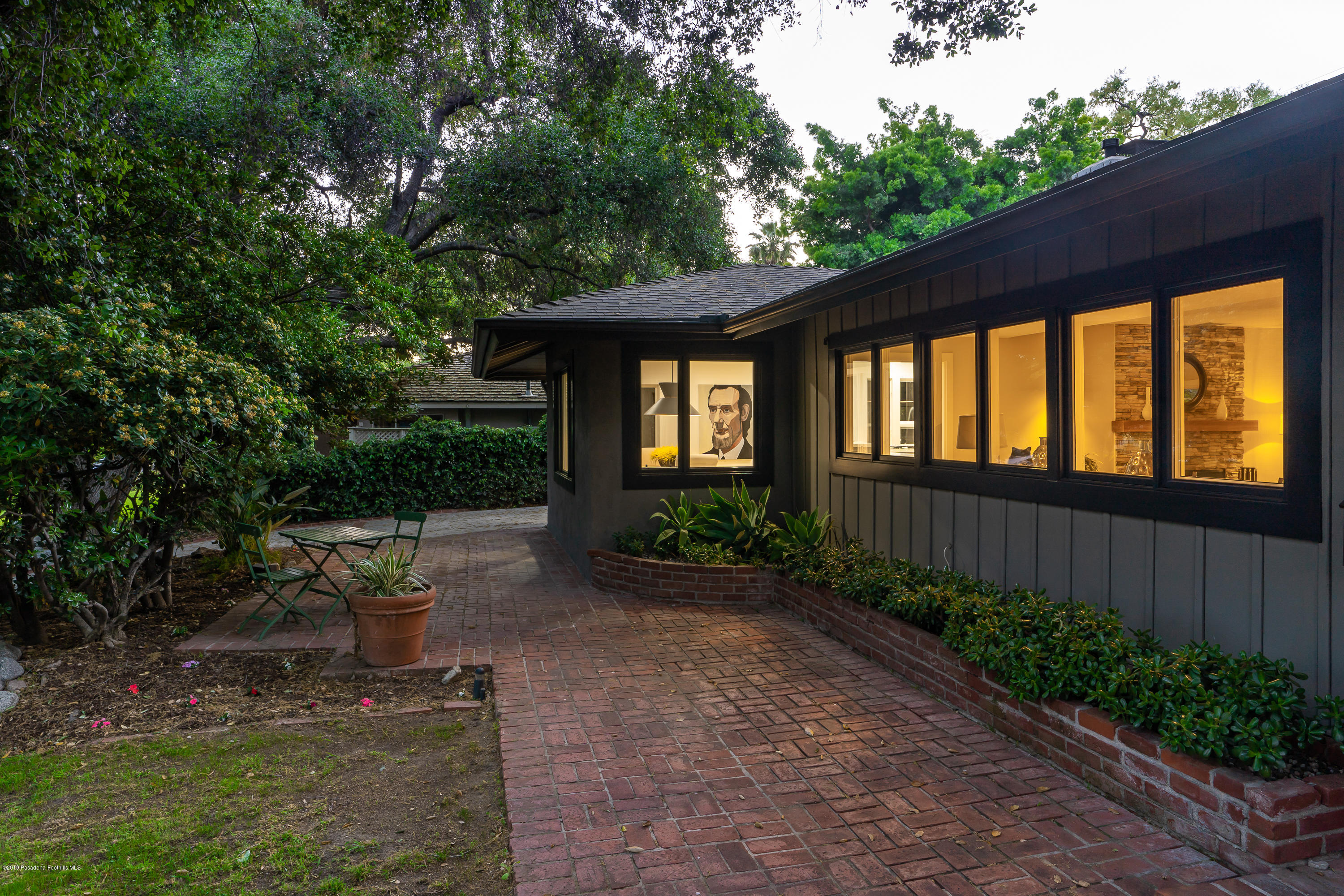 3795 Shadow Grove Road Pasadena, CA 91107 - Photo 43 of 48 a front view of a house with a yard