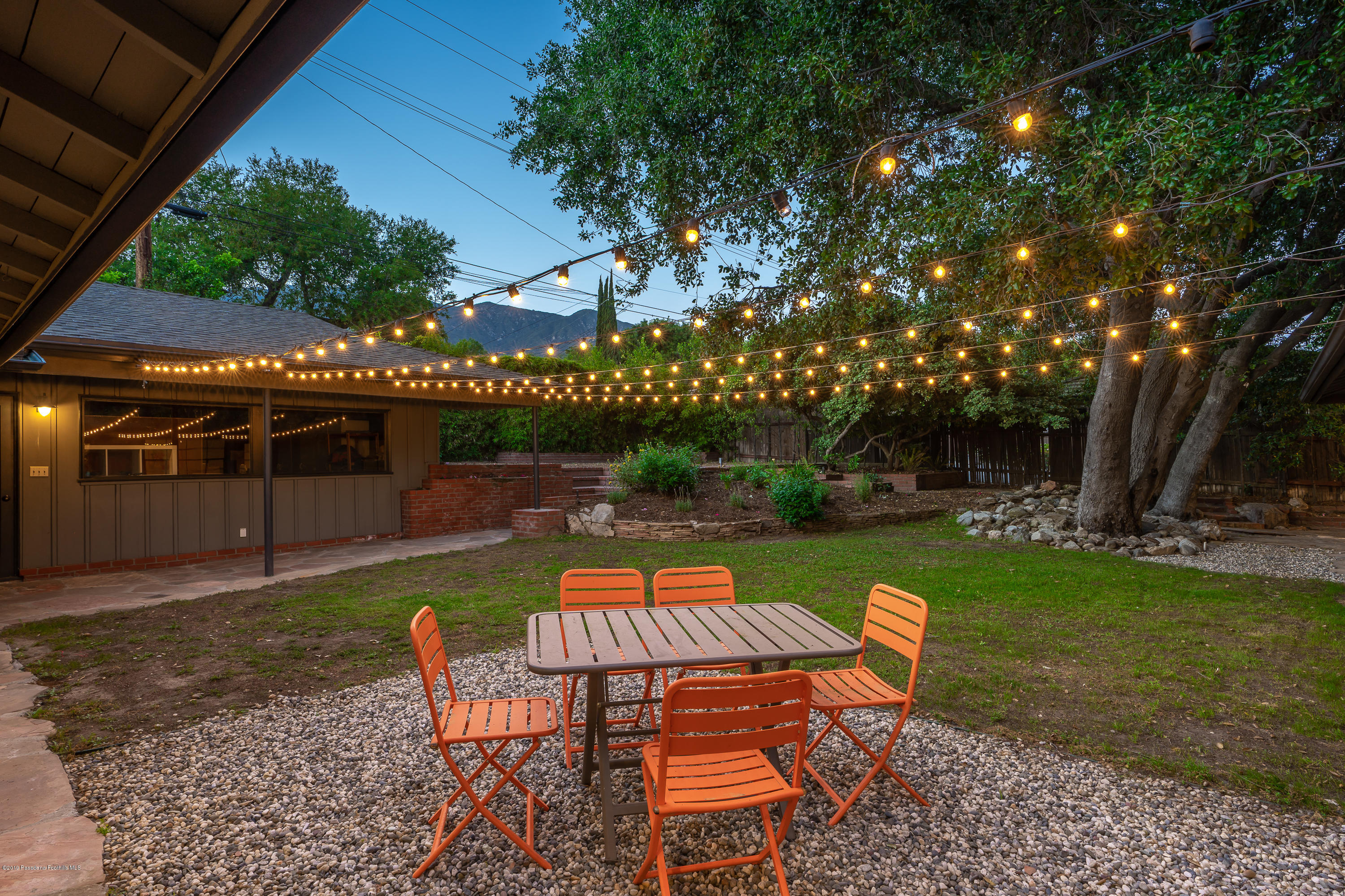 3795 Shadow Grove Road Pasadena, CA 91107 - Photo 44 of 48 a patio with water view fountain and outdoor seating