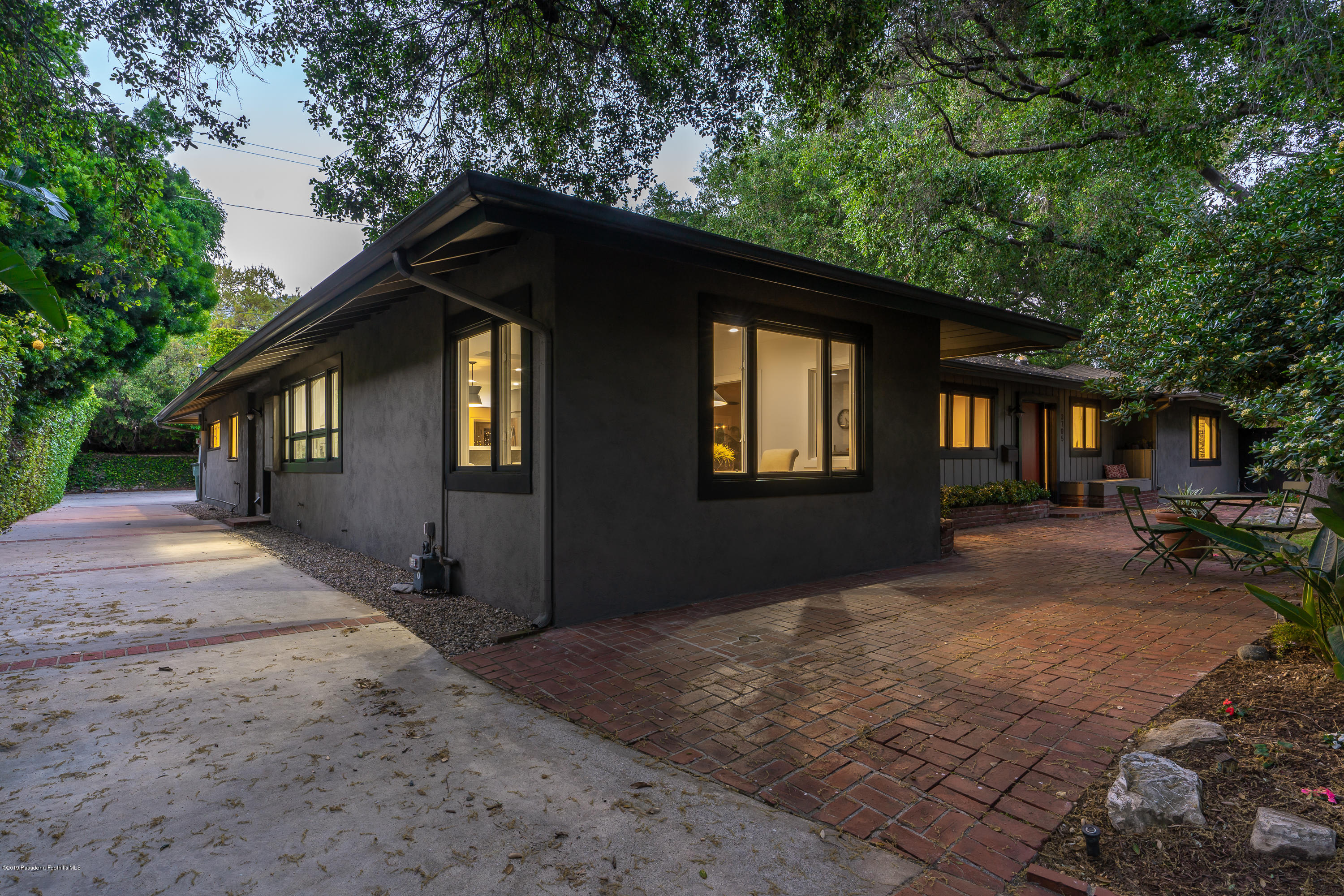 3795 Shadow Grove Road Pasadena, CA 91107 - Photo 47 of 48 a front view of a house with a yard
