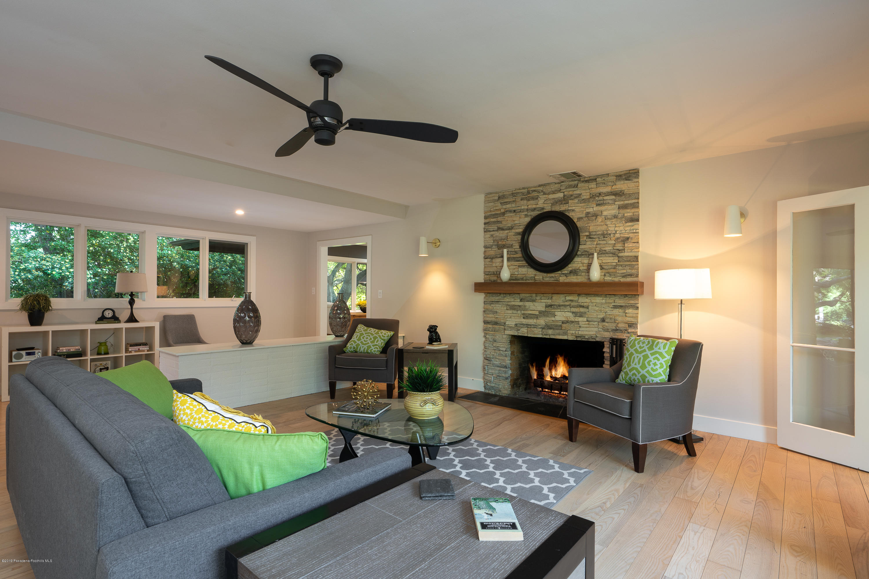 3795 Shadow Grove Road Pasadena, CA 91107 - Photo 10 of 48 a living room with furniture and a fireplace