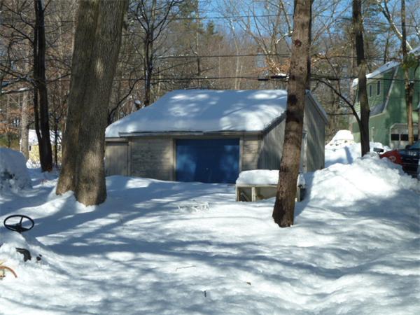 22 Birchmeadow Road Amesbury, MA 01913 - Photo 2 of 11 a view of a house with a yard and sitting area