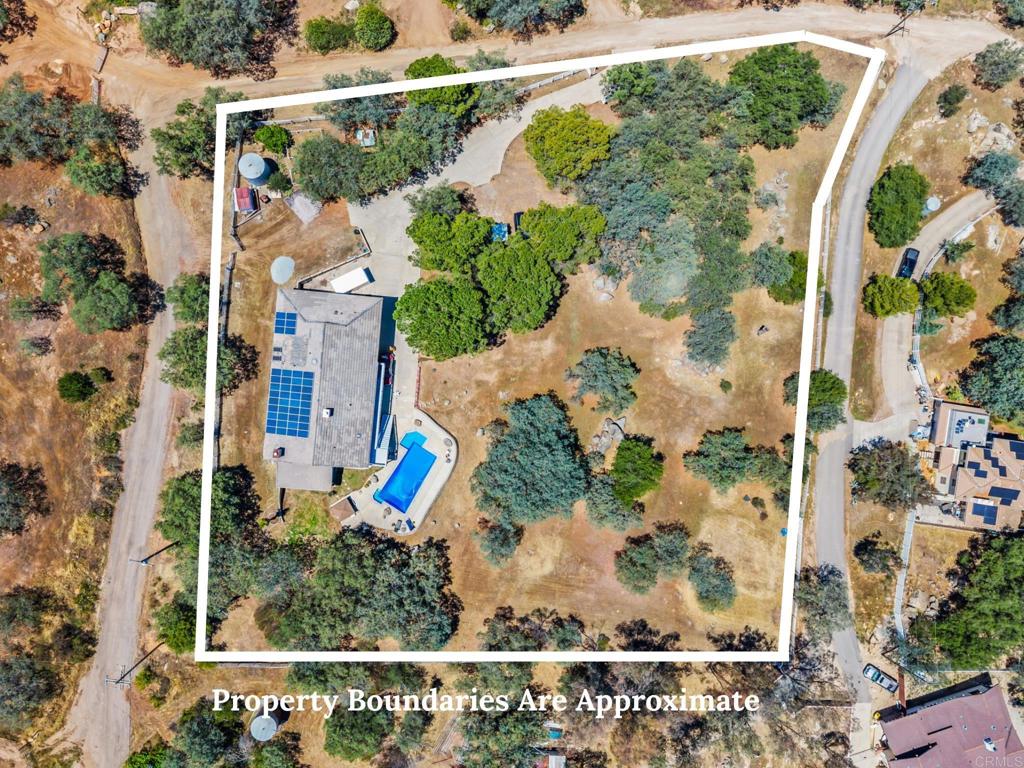 17901 Lyons Valley Road Jamul, CA 91935 - Photo 10 of 52 an aerial view of a house with a yard and garden