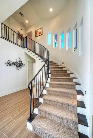 a view of entryway with wooden floor