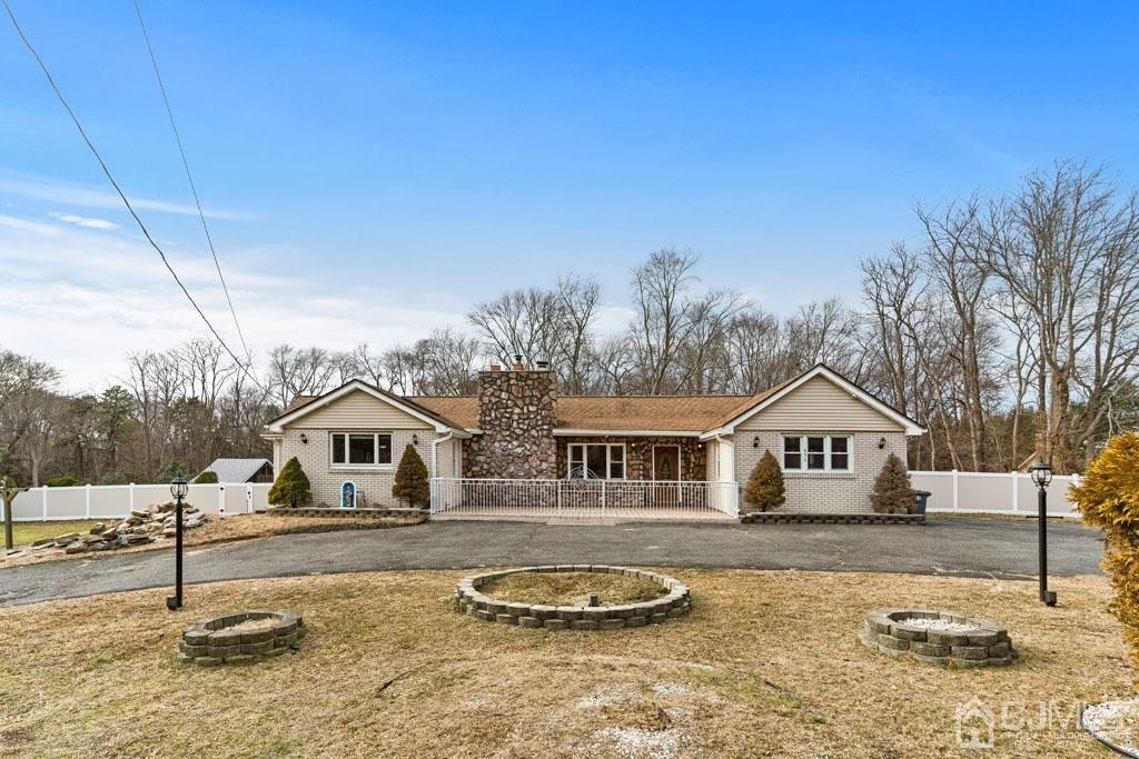 436 Tennent Road Morganville, NJ 07751 - Photo 1 of 36 Front of home with large driveway