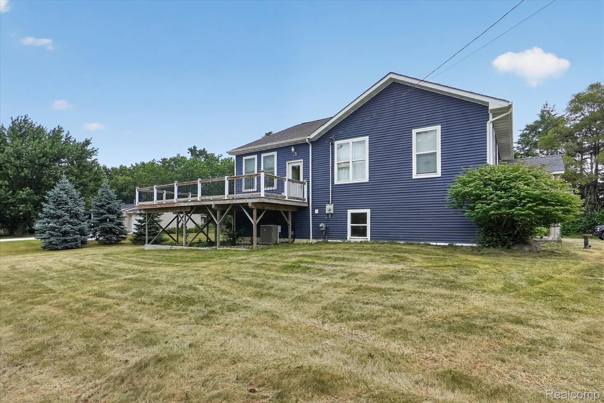 6524 Kelly Road Flushing, MI 48433 - Photo 45 of 47 Exterior showcasing blue siding and white trim