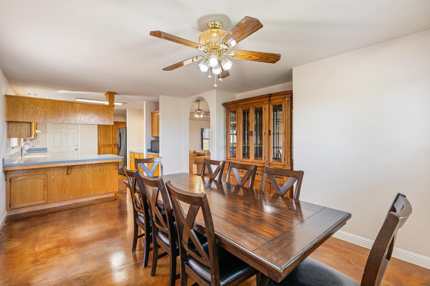 14304 Huntington Road Madera, CA 93636 - Photo 11 of 33 a dining room with furniture and window