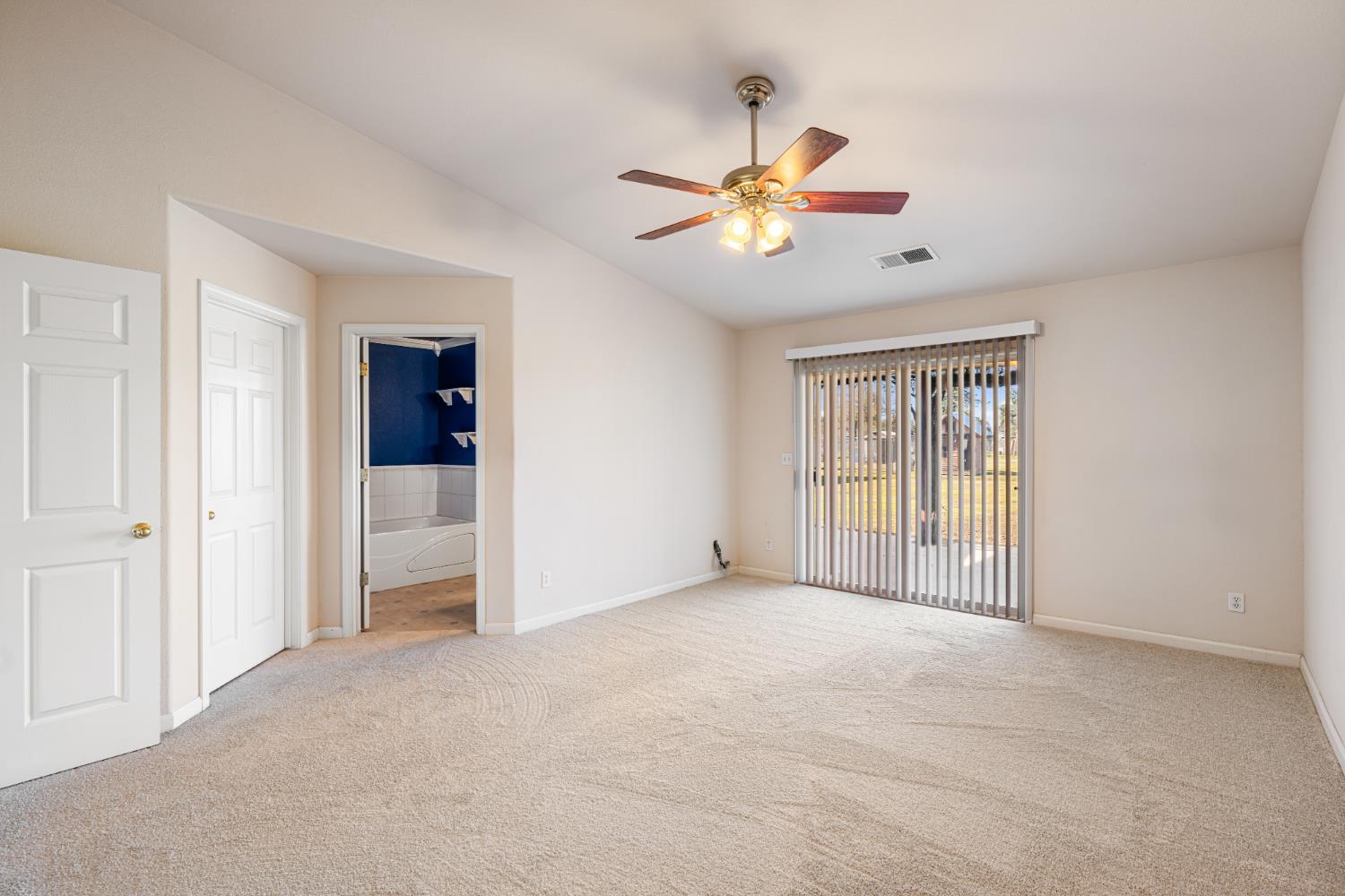 14304 Huntington Road Madera, CA 93636 - Photo 21 of 33 a view of an empty room with a window