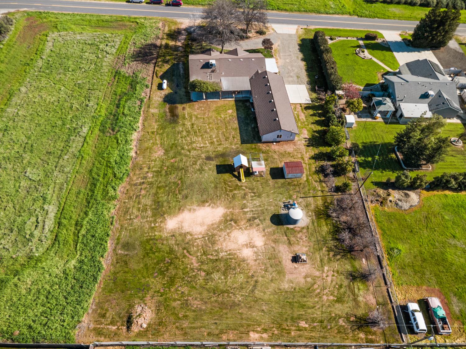 14304 Huntington Road Madera, CA 93636 - Photo 33 of 33 a bird view of residential house and outdoor space
