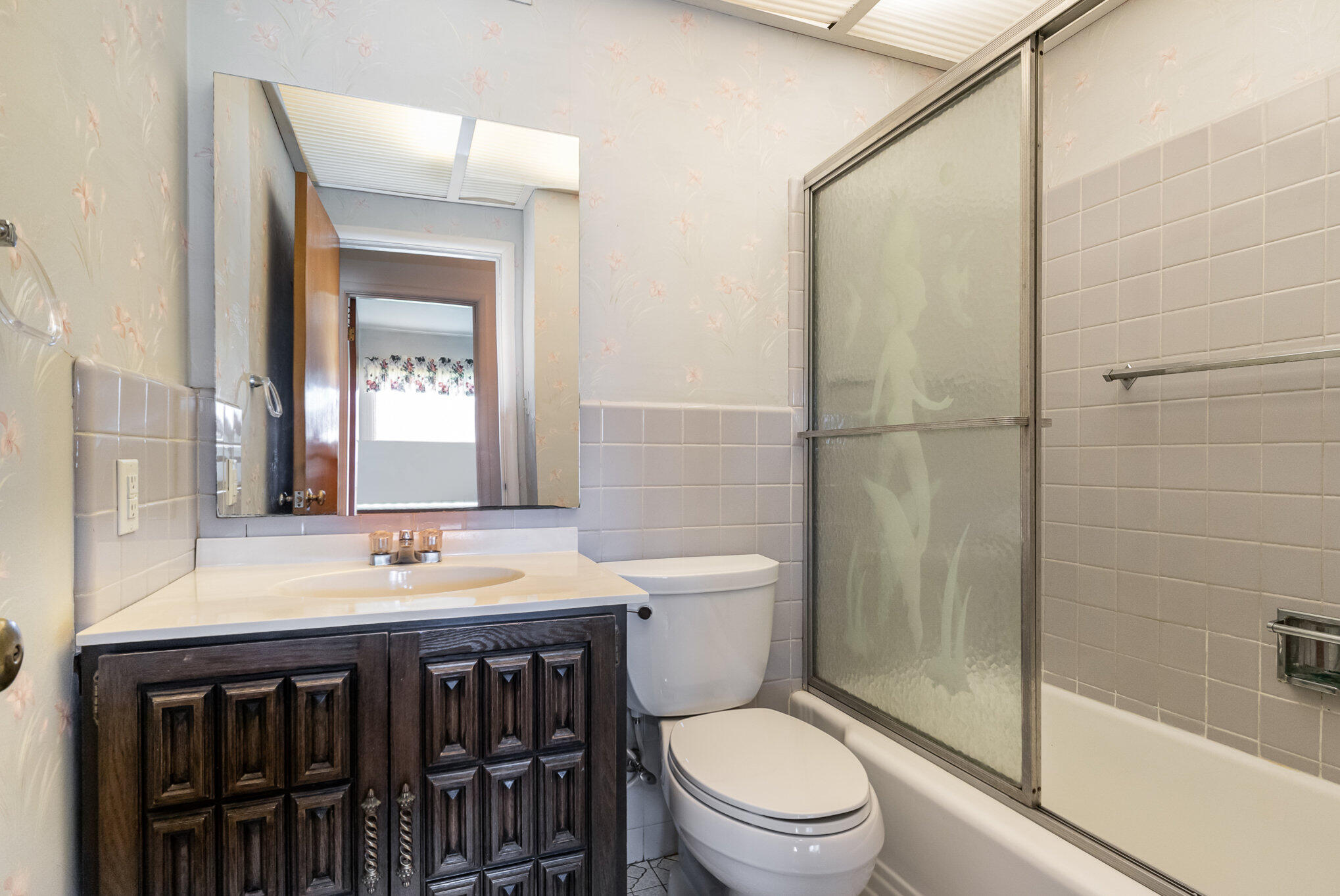 2147 Chastleton Drive Long Beach, IN 46360 - Photo 11 of 16 a bathroom with a sink a toilet and shower