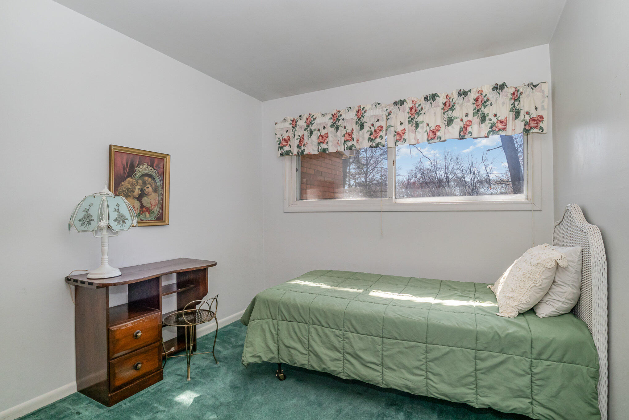 2147 Chastleton Drive Long Beach, IN 46360 - Photo 12 of 16 a bedroom with a bed and a window