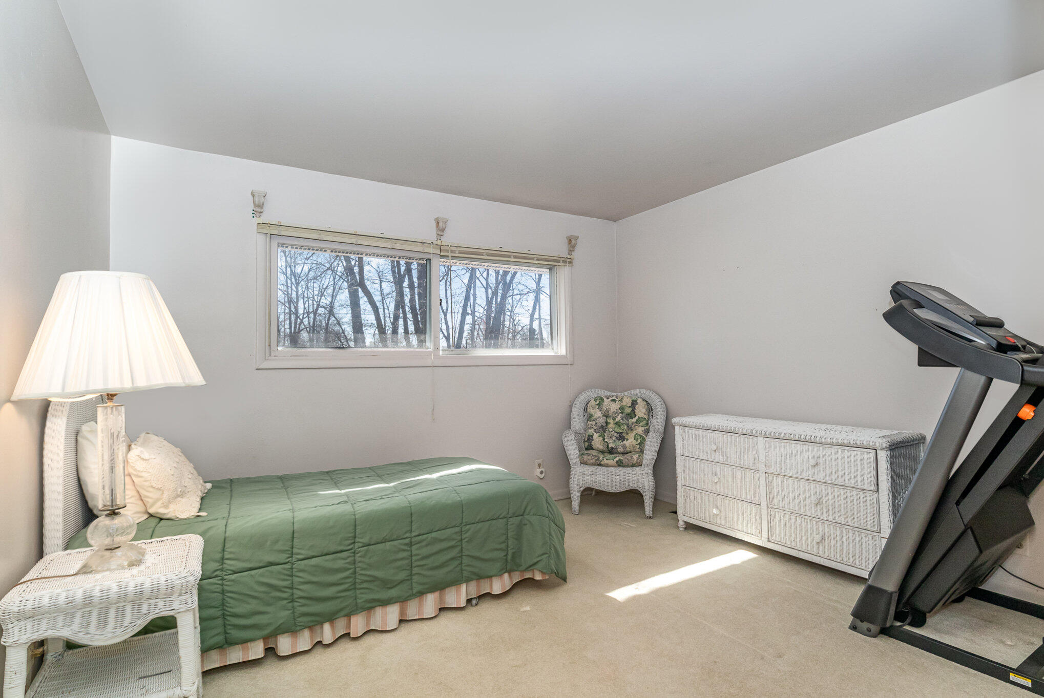 2147 Chastleton Drive Long Beach, IN 46360 - Photo 13 of 16 a bedroom with a bed and a window