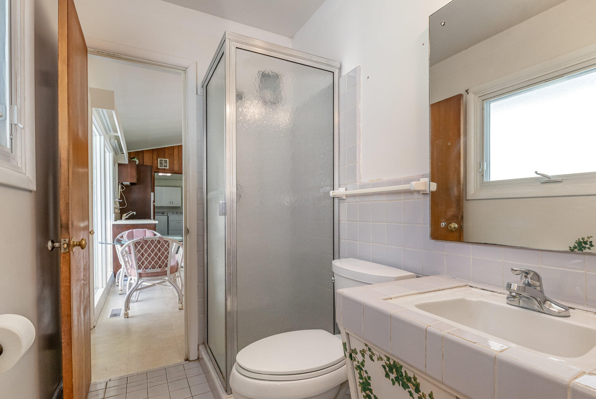 2147 Chastleton Drive Long Beach, IN 46360 - Photo 14 of 16 a bathroom with a sink toilet and shower