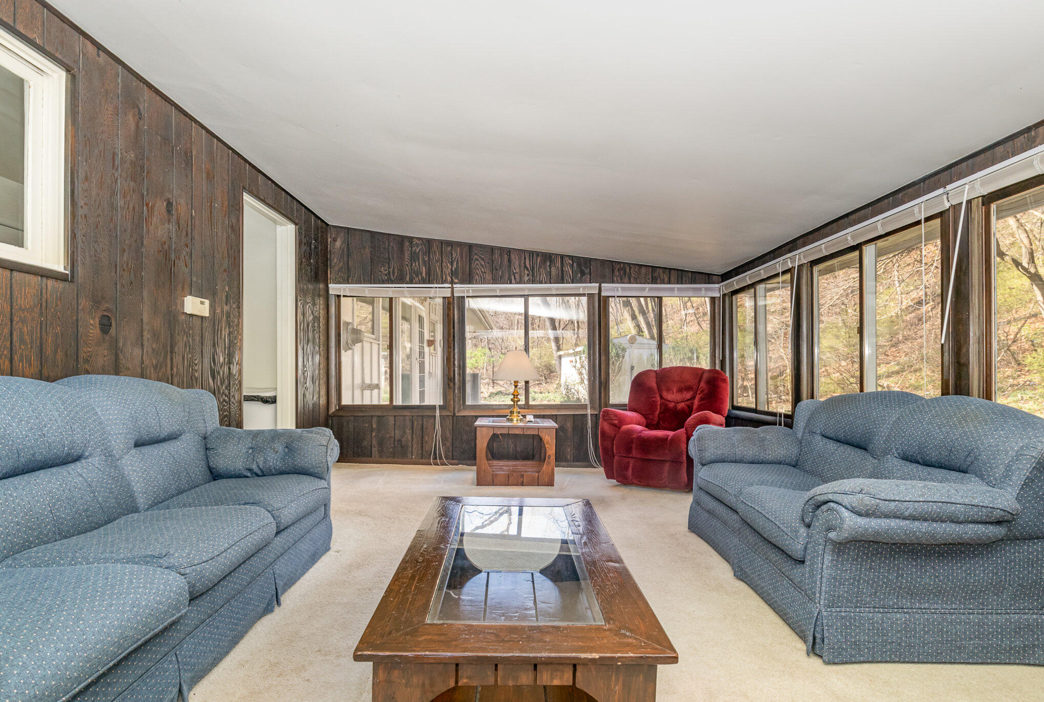2147 Chastleton Drive Long Beach, IN 46360 - Photo 5 of 16 a living room with furniture and a large window