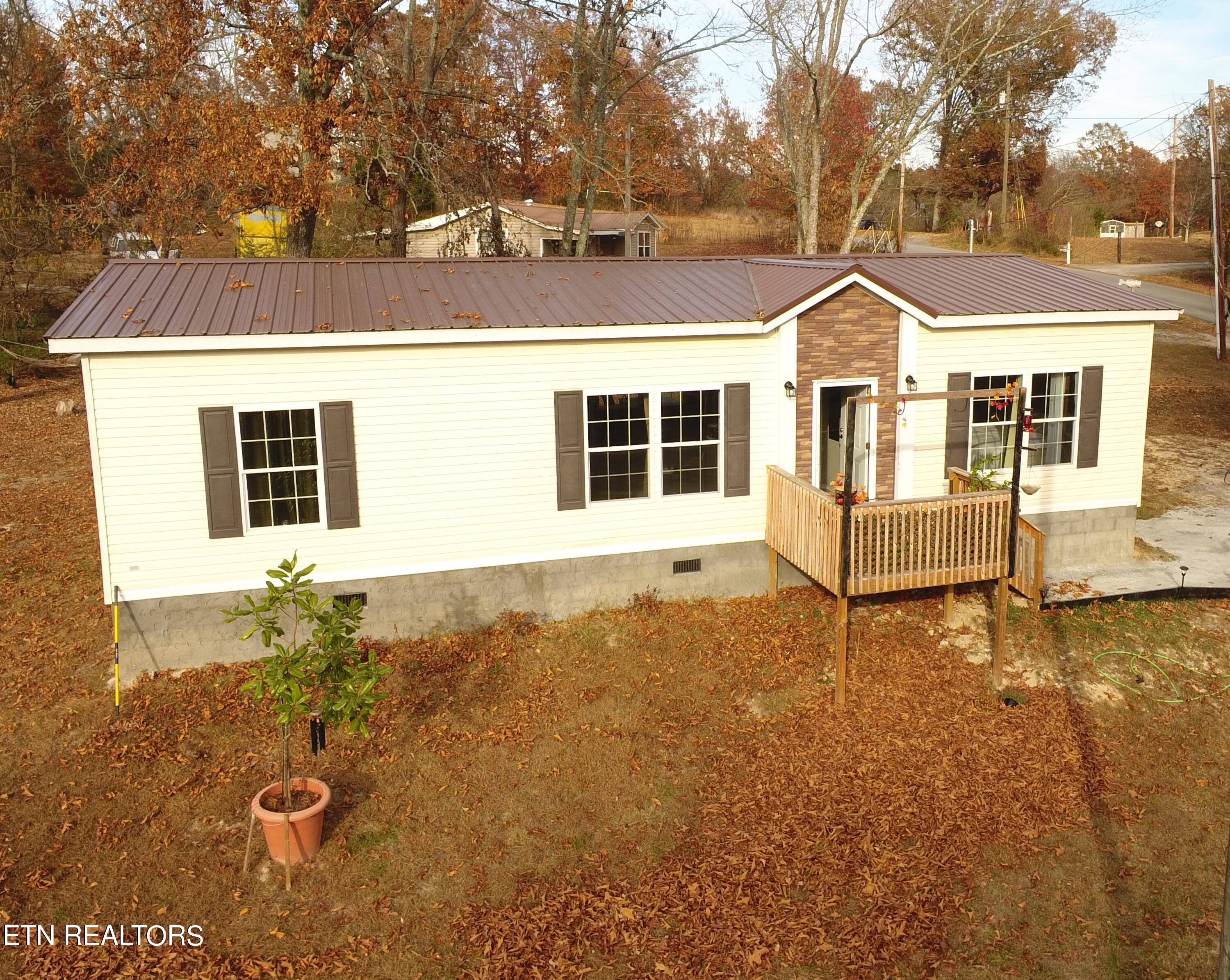 481 Wilkey Road Dayton, TN 37321 - Photo 3 of 21 Front, metal roof