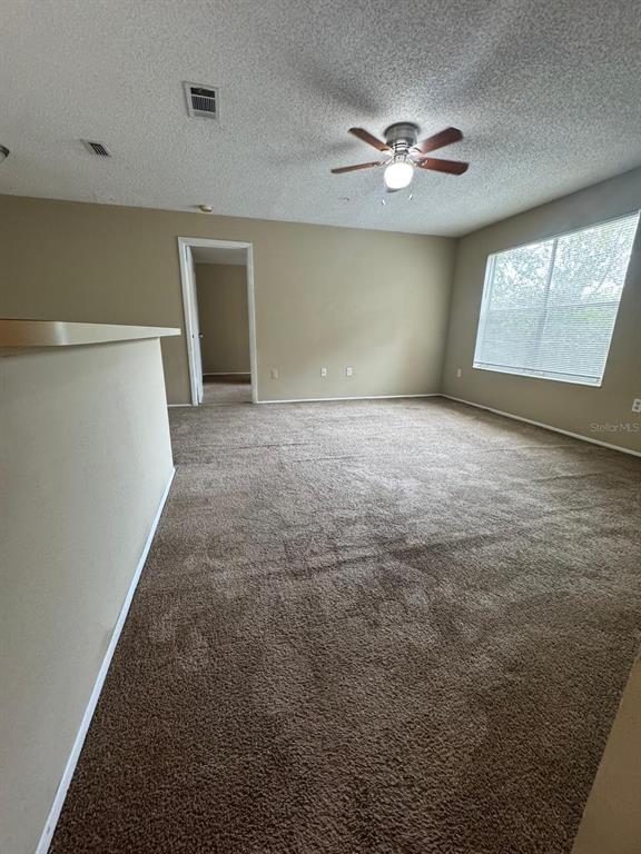 956 Salt Pond Place, Unit 205 Altamonte Springs, FL 32714 - Photo 13 of 15 a view of an empty room with a window