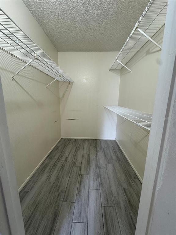 956 Salt Pond Place, Unit 205 Altamonte Springs, FL 32714 - Photo 14 of 15 a view of a room with wooden floor