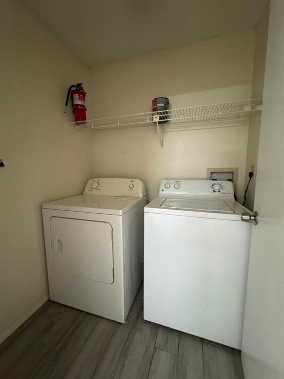 956 Salt Pond Place, Unit 205 Altamonte Springs, FL 32714 - Photo 15 of 15 a utility room with dryer and washer