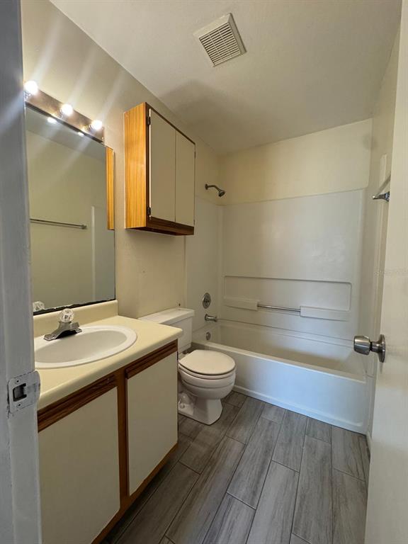 956 Salt Pond Place, Unit 205 Altamonte Springs, FL 32714 - Photo 10 of 15 a bathroom with a sink toilet and shower