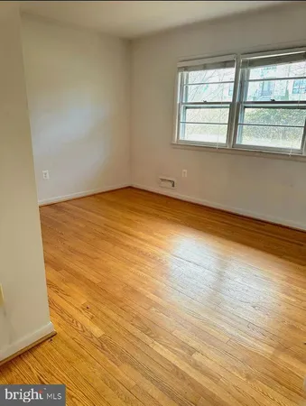 a view of room and wooden floor