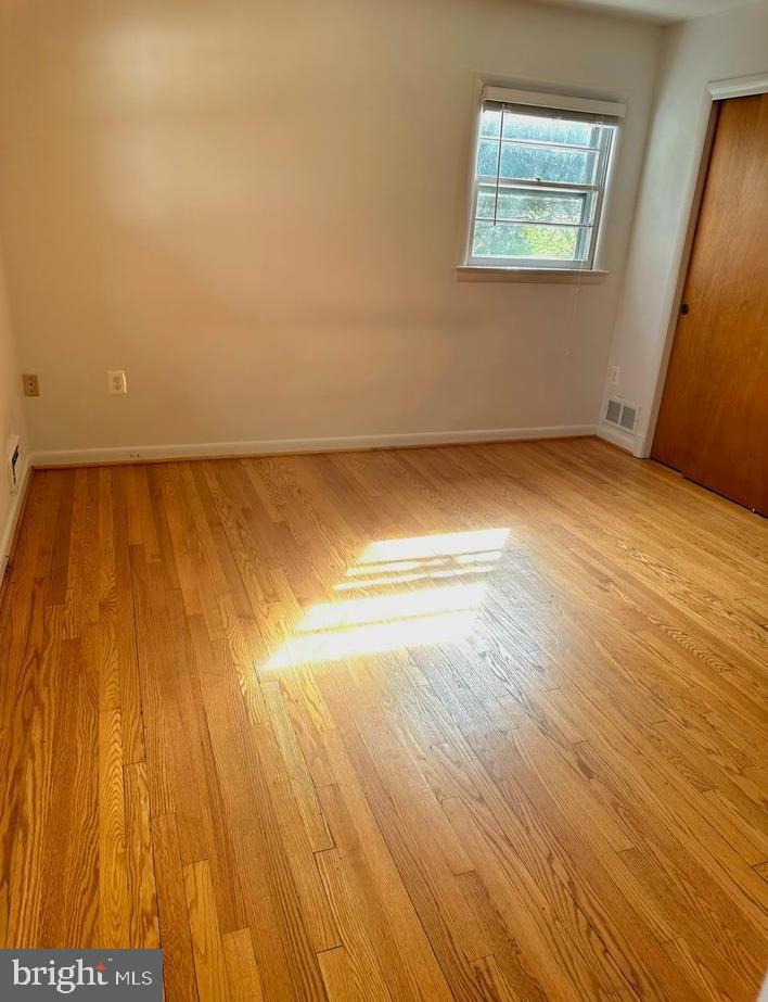 6426 Noble Drive McLean, VA 22101 - Photo 13 of 16 a view of room and wooden floor