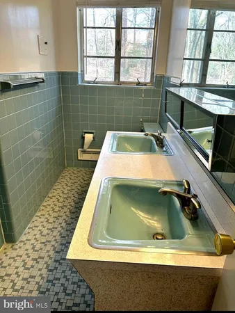 a bathroom with a bath tub